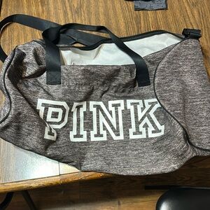 Pink duffle bag.